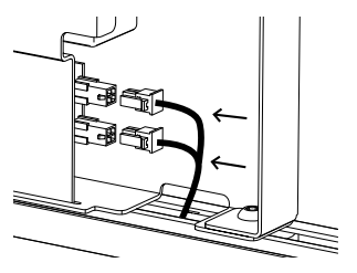 Two cables feeding into connectors on the inner channel of a KAOS frame section, indicated by arrows