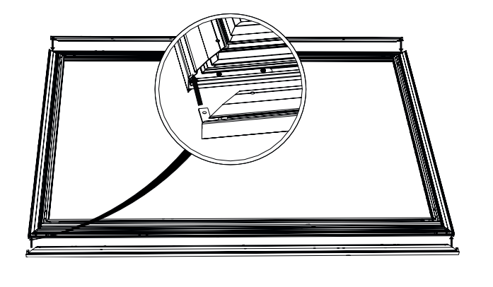 Corner bracket inserted into outer and inner channels of frame section, with magnified detail view