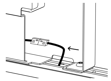Arrow indicating direction to slide LED controller unit into frame channel during installation