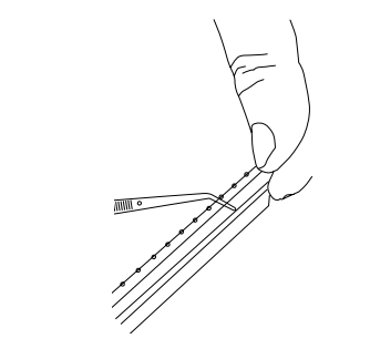 Hand pulling trim strip away from retention frame end during removal step