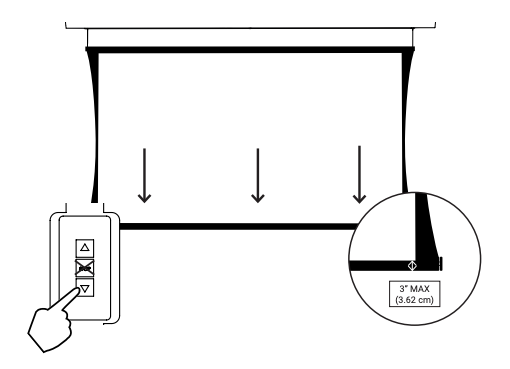 Hand pressing down button on wall control, lowering screen until tension is released, with 3-inch max drop detail callout