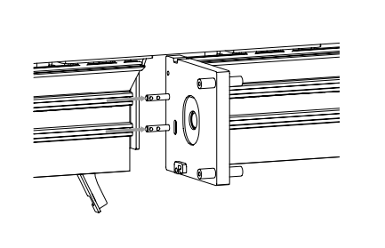Intermediate plate with pins inserted into t-slot of shade extrusion during coupler installation