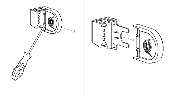 Screwdriver removing idler end cap, then end cap separating from bracket exploded view