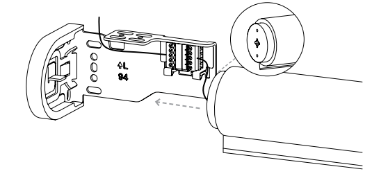 Motor end inserting into bracket with idler end cap alignment shown via dashed arrow