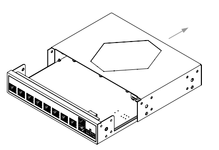 Janus controller unit with top cover lifting away, shown in exploded isometric view