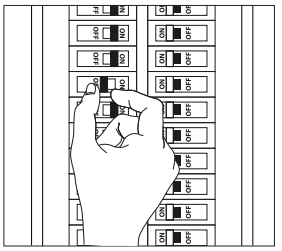 Hand flipping a circuit breaker to the OFF position in a electrical panel