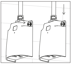 Mounting tab sliding over screw head to lock outdoor outlet in place