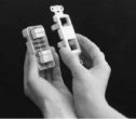 Hands connecting a terminal block to a Spike device during Decoset wiring setup