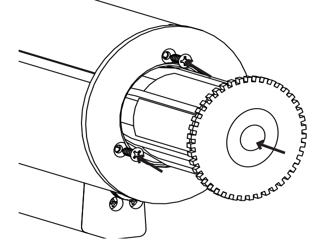 Toothed idler wheel at end of roller tube with arrow indicating counterclockwise rotation