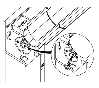 Power cord routed through KAOS cassette housing with grommet detail callout