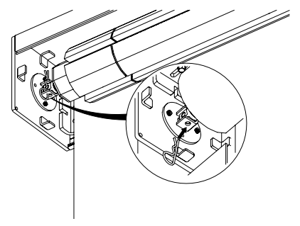 Motor head attached to motor bracket with clip securing connection, close-up inset detail shown