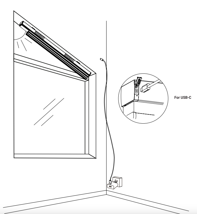 Niño shade power cable routed down wall to outlet, with USB-C connector detail inset at top corner bracket