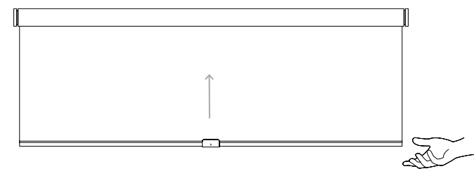 Hand pushing up on hem bar to lock shade onto wall brackets