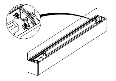 Cassette interior diagram with zoomed inset showing internal brackets and material roll assembly
