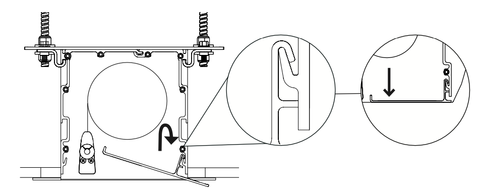 Cross-section diagram showing case hooked onto L-bracket with callouts indicating bracket hook engagement and downward tightening direction