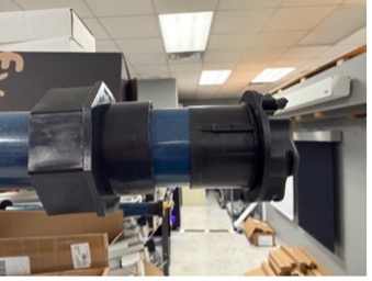 Black and blue KAOS roller tube assembly with end cap components visible from front view